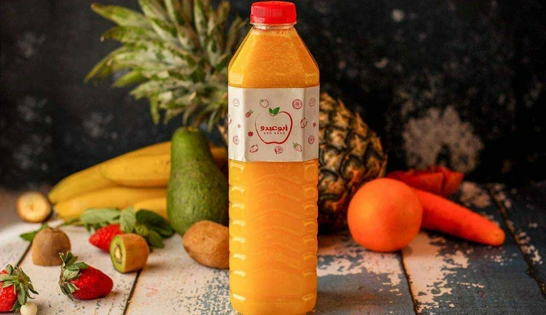 عصير برتقال وتفاح وجزر